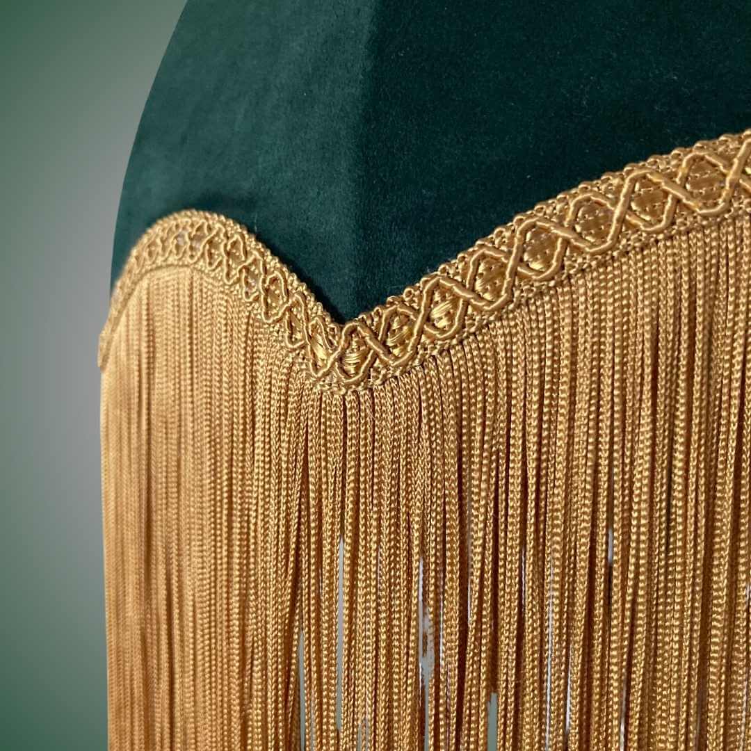 vintage style parachute lampshade in Green velvet with deep gold fringe topped with braid close up 