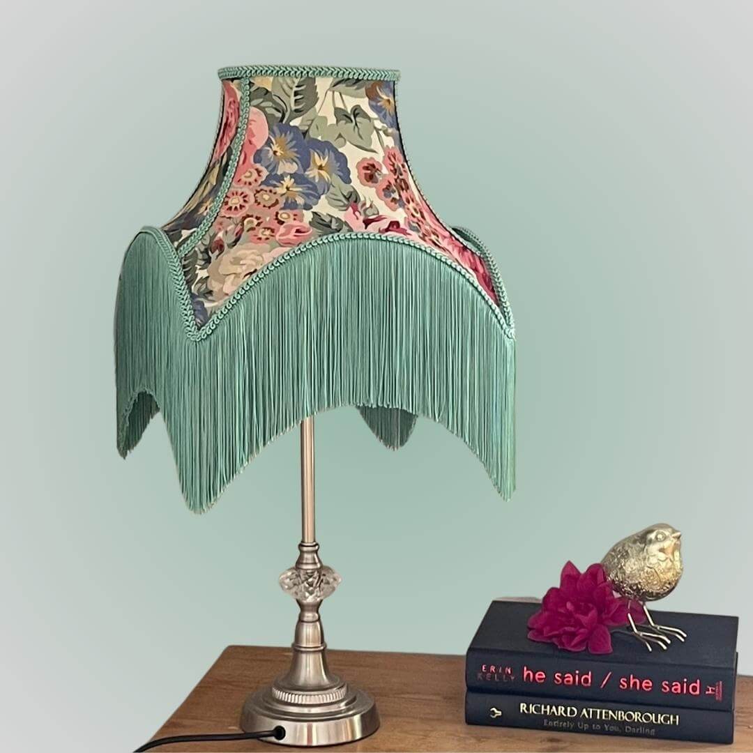 vintage style bowed empire lampshade with cut outs in floral chintz on table